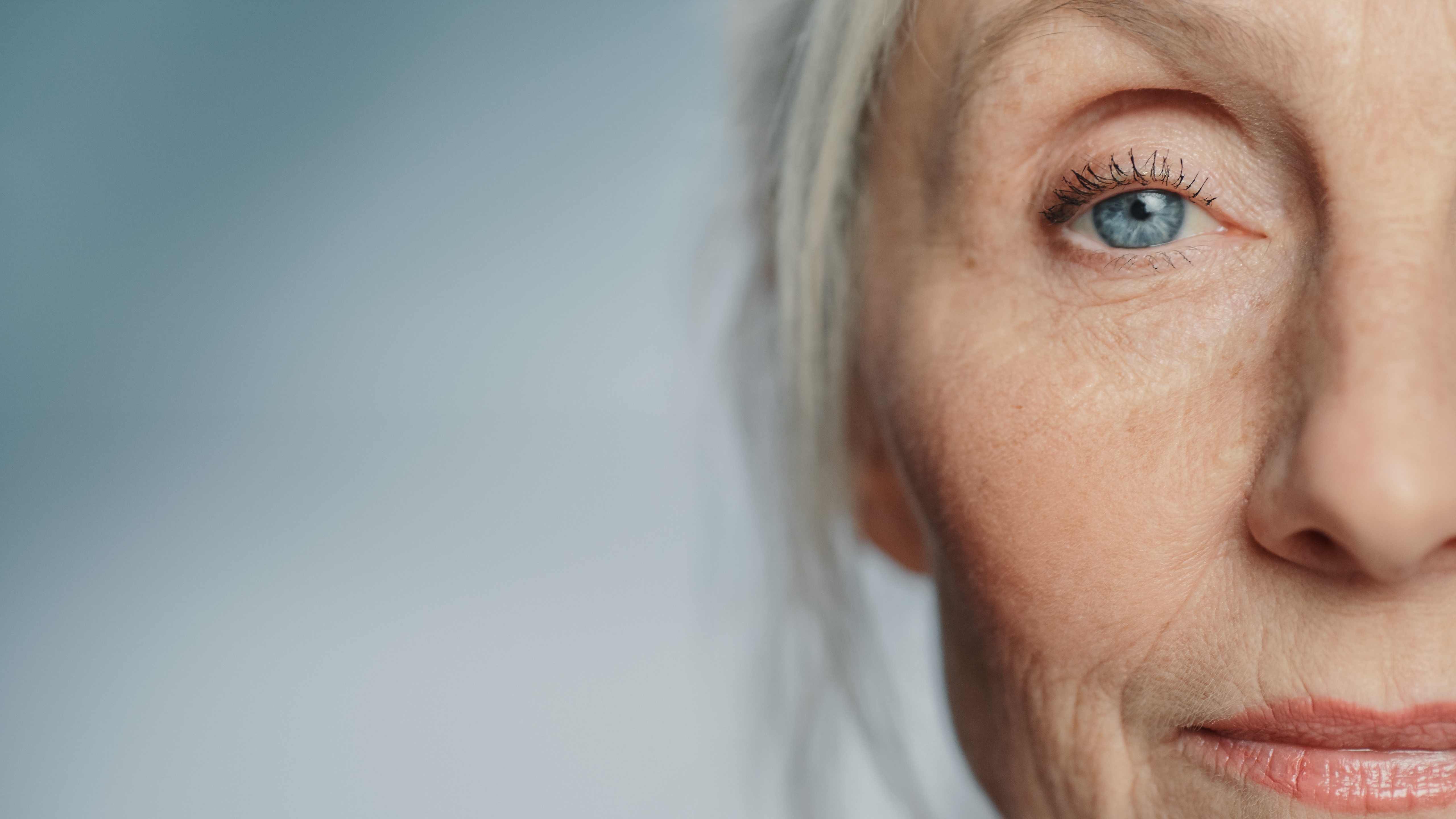 Close portrait of an older woman looking to camera